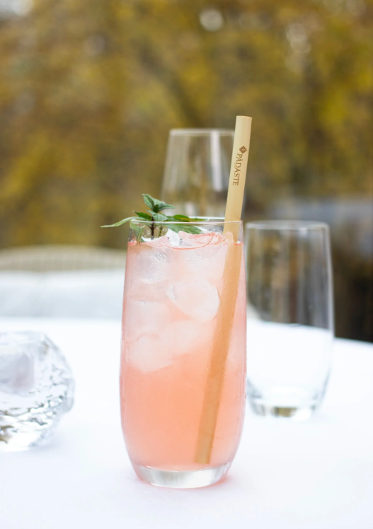 Natural branded reed straw served in a pink cocktail